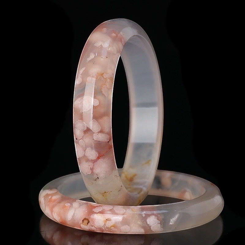 BoxUnboxed Natural Flower Agate Sakura Bangles with delicate pink floral inclusions, polished smooth stone.
